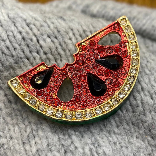 Broche symbole pastèque rouge étincelante
